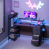51 Inch Gaming Desk with Power Outlet and LED Lights, Computer Desk with 4 Drawers & Storage Shelves, Reversible Home Office Desk