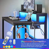 Small Computer Desk with Charging Station and LED Lights, Gaming Desk with Monitor Stand, 2-Tier Home Office Desk, Black