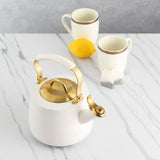 Stainless Steel Stovetop Tea Kettle, 1.8 Liter Capacity, Whistling Kettle with Folding Handle, Induction Compatible, For Gas Electric and Induction Cooktops (White & Gold)