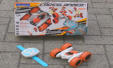 LEXiBOOK- Crosslander Luminous Terrain Car, Wrist Remote, Rechargeable, Electronic Action Kit, White/Orange, Color