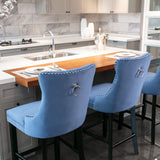 MOOLSUN Set of 4 Blue Velvet Bar Stools - Classic Fixed Height Design with Button Tufted Seat, Solid Wood Frame & Chrome Nailheads, Perfect for Standard Kitchen Island & Home Bar,Blue(Wood Leg)