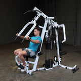 Body-Solid (EXM2500BLPSRSTK) Multi-Station Home Gym Machine, Arm & Leg Strength Training Functional Exercise Workout Station, 210lbs. Red Weight Stack with Leg Press Body-Solid