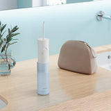 Panasonic Water Flosser for Travel, Cordless Portable Oral Irrigator with Two Water Pressure Settings, Collapsible Water Tank - EW-DJ11-A