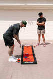 PutterBall Original Golf Putting Game Set – Backyard Putting Green Pong Style Golf Mat with 2 Putters, 2 Balls & Hole Covers - Red, 9ft