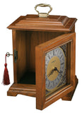 Howard Miller Continuum Mantel Clock Urn Box 800-120 – Oak Yorkshire Finish, Select Hardwoods & Veneers, Bracket-Style Roman Numeral Clock, Interior Compartment, Funeral Urn Box