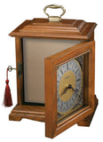 Howard Miller Continuum Mantel Clock Urn Box 800-120 – Oak Yorkshire Finish, Select Hardwoods & Veneers, Bracket-Style Roman Numeral Clock, Interior Compartment, Funeral Urn Box
