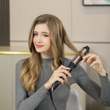 Heikki Vision 5-in-1 Curling Iron Set, including a curling comb and 4 interchangeable